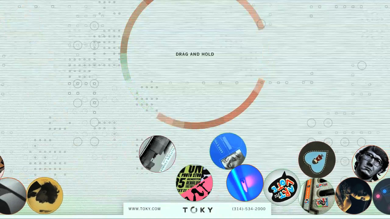 A hand using a large touch-screen interface
